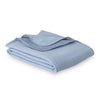 Blue VelvetLoft Gauze Throw folded neatly on a white surface.