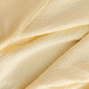 Clsoe up of a yellow VelvetLoft Gauze Throw.