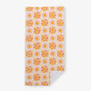 Vicky Yorke Summer Nostalgia beach towel laid flat on a white surface.