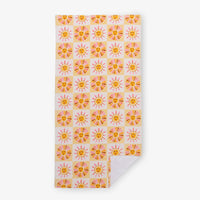 Vicky Yorke Summer Nostalgia beach towel laid flat on a white surface.