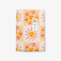 Vicky Yorke Summer Nostalgia beach towel folded neatly on a white surface.