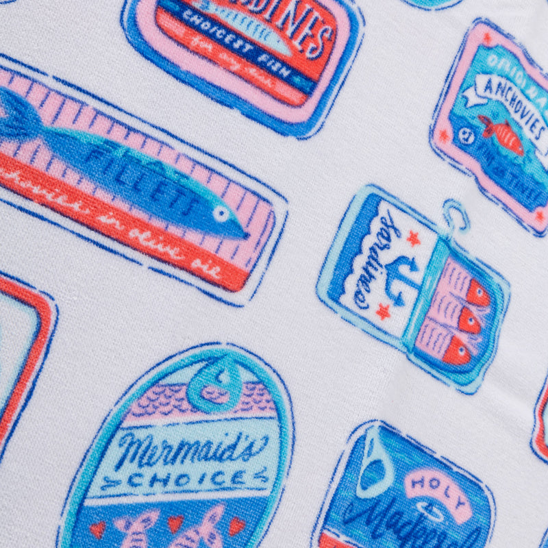 Close up of a Krissy Mast Sardine printed beach towel.