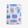 Krissy Mast Sardine printed beach towel folded neatly on a white surface.
