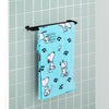 Blue Peanuts beach towel draped neatly over a towel hanger in a bathroom.