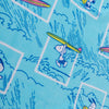 Close up of a blue peanuts beach towel.