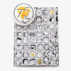 Peanuts 75th Anniversary Throw & Pillow Set on a white surface.