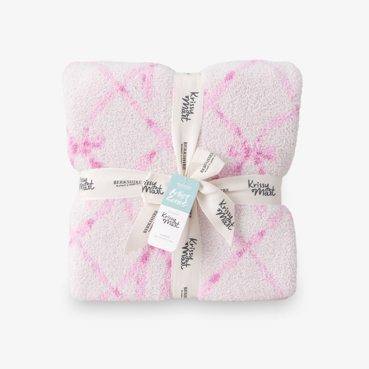 Krissy Mast Mellowsoft Bow Throw folded neatly on a white surface.