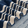 Close-up of a blue and white striped fabric texture