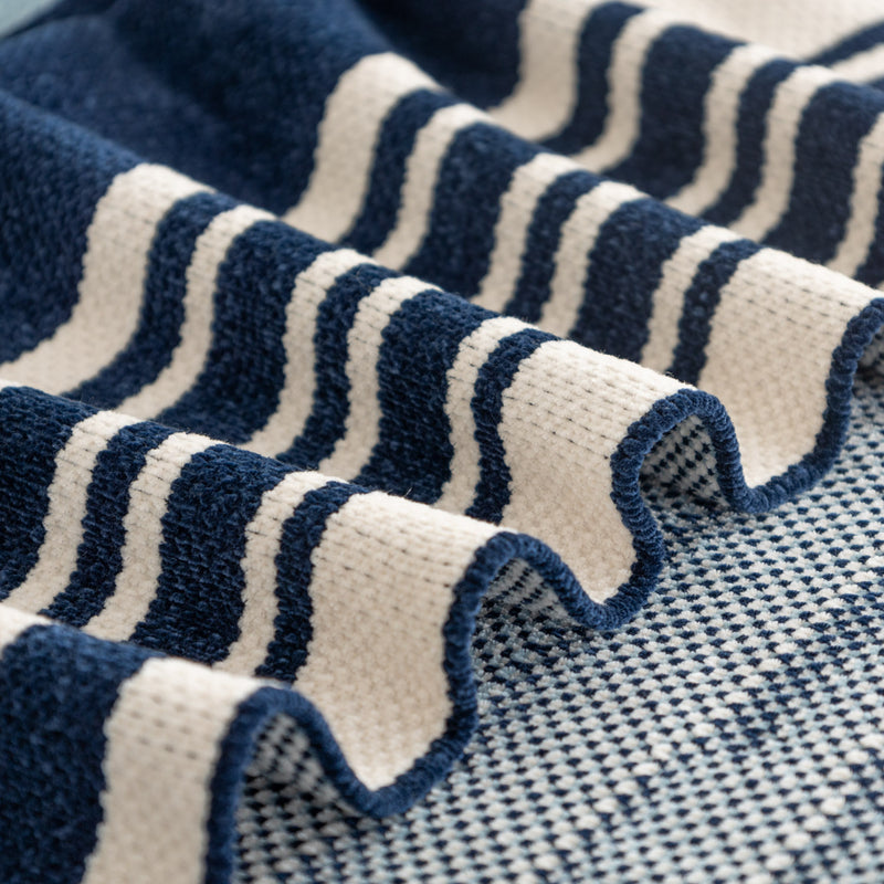 Close-up of a blue and white striped fabric texture