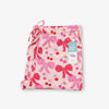 Krissy Mast printed lounge pants folded neatly on a white surface.
