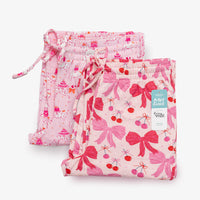 Krissy Mast printed lounge pants folded neatly on a white surface.