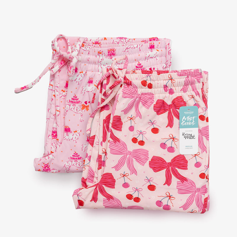 Krissy Mast printed lounge pants folded neatly on a white surface.