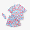 Krissy Mast floral printed lounge set laid flat on a white surface.