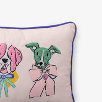 Krissy Mast dog printed pillow sitting on a white surface.