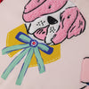 Close up of a Krissy Mast dog printed pillow.