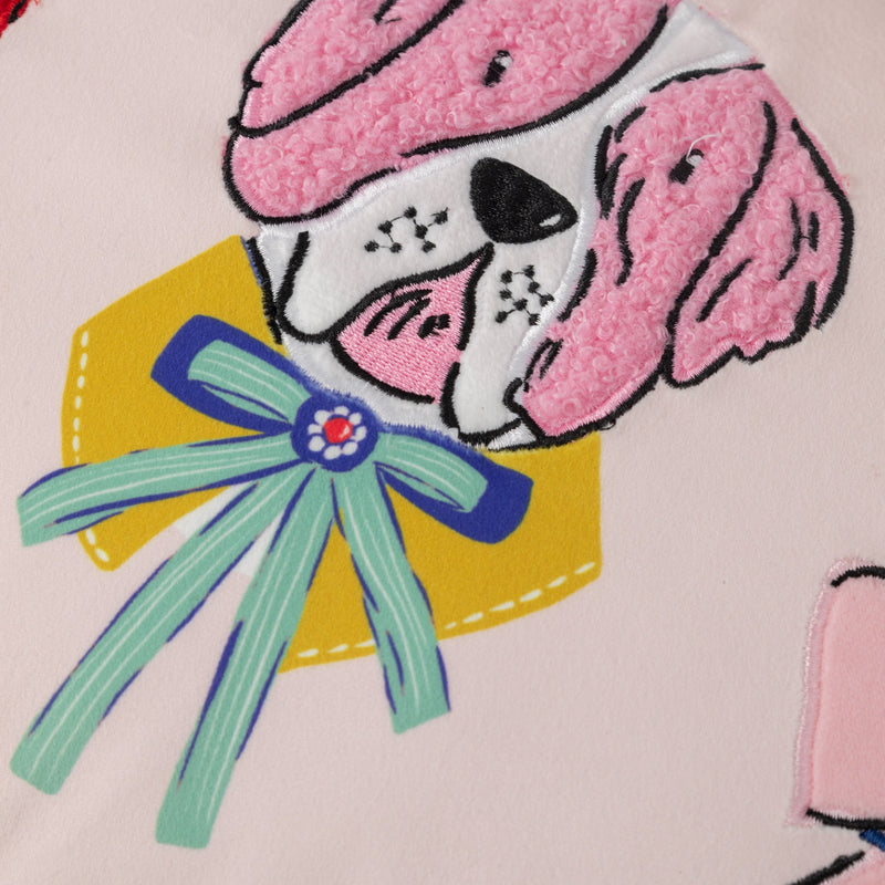 Close up of a Krissy Mast dog printed pillow.