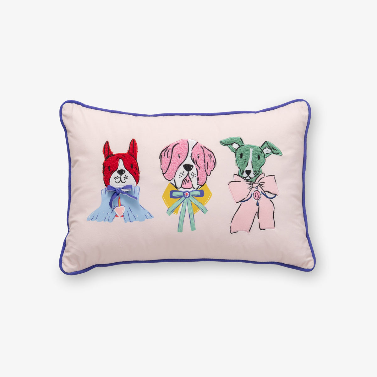 Krissy Mast dog printed pillow sitting on a white surface.