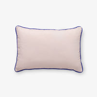 Krissy Mast dog printed pillow sitting on a white surface.