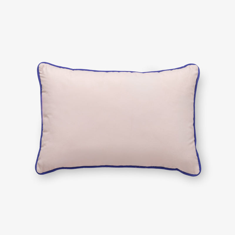Krissy Mast dog printed pillow sitting on a white surface.