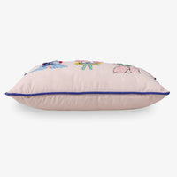 Krissy Mast dog printed pillow sitting on a white surface.