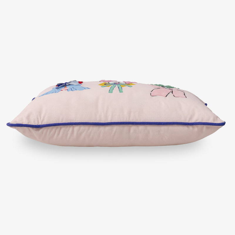 Krissy Mast dog printed pillow sitting on a white surface.