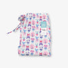 Krissy Mast printed lounge pants folded neatly on a white surface.