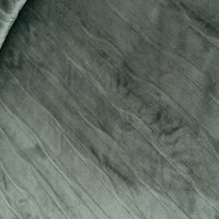 Close-up of textured green fabric with a subtle pattern