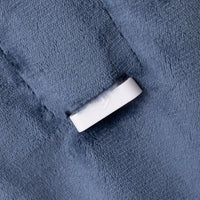 White connector on a textured blue surface