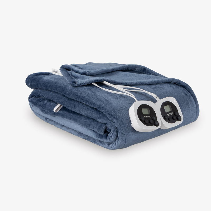 Folded electric blanket with control panels on a white background