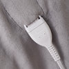 White electronic device on a gray textured surface