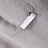 White connector on a textured gray surface