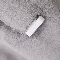 White connector on a textured gray surface