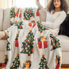 Cat printed holiday throw draped over a womans legs.