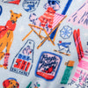 Colorful pattern with skiers, dogs, and skiing equipment on a white background
