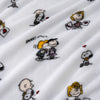 Close-up of fabric with cartoon character pattern on a white background