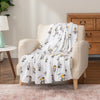 Valentines peanuts throw draped over a beige chair.