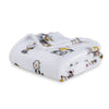 Folded blanket with cartoon character pattern on a white background