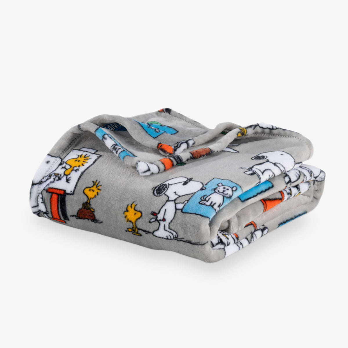 Folded blanket with cartoon character pattern on a white background