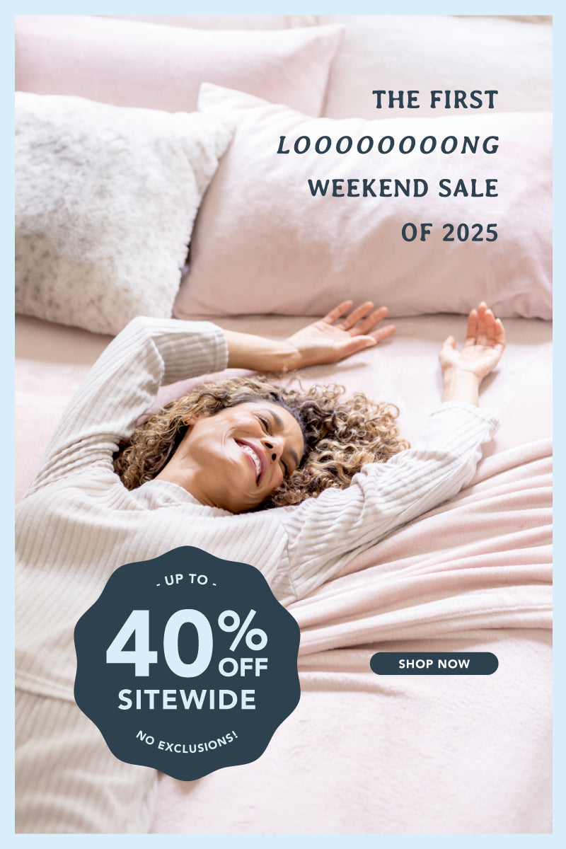 The first looooooong weekend sale of 2025, up to 40% off sitewide, no exclusions with a woman laying on our pink VelvetLoft Sheets.