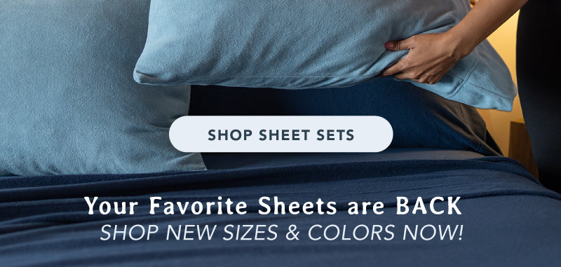 text overlaid on fabric. Text reads "Your Favorite Sheets are back: Shop New Sizes and Colors - Shop Now"