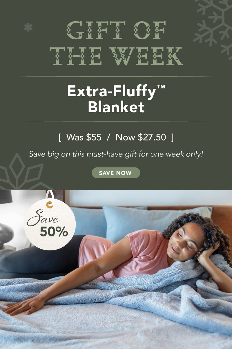Promotional banner for an extra-fluffy blanket with a discount offer, featuring a woman wrapped in the blanket.