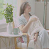 Video with a model and our MelloKnit Throw.